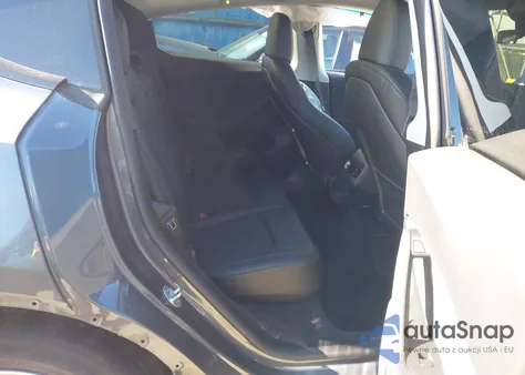 2023 Tesla Model Y Awd/Long Range Dual Motor All-Wheel Drive z USA, uszkodzony, nr VIN 7SAYGDEE3PF865229